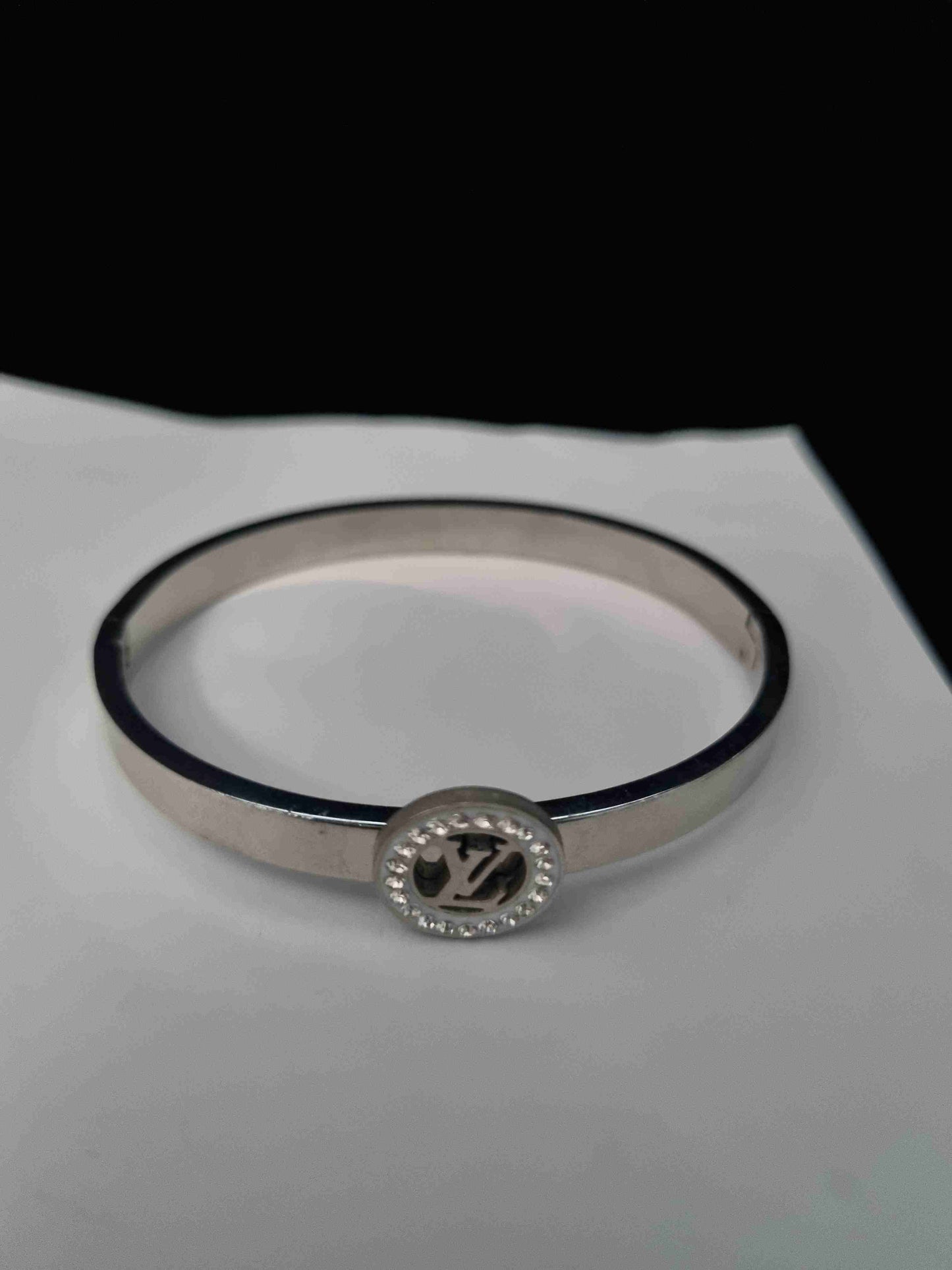 Elegant silver bracelet for women featuring a sleek and minimalist design.