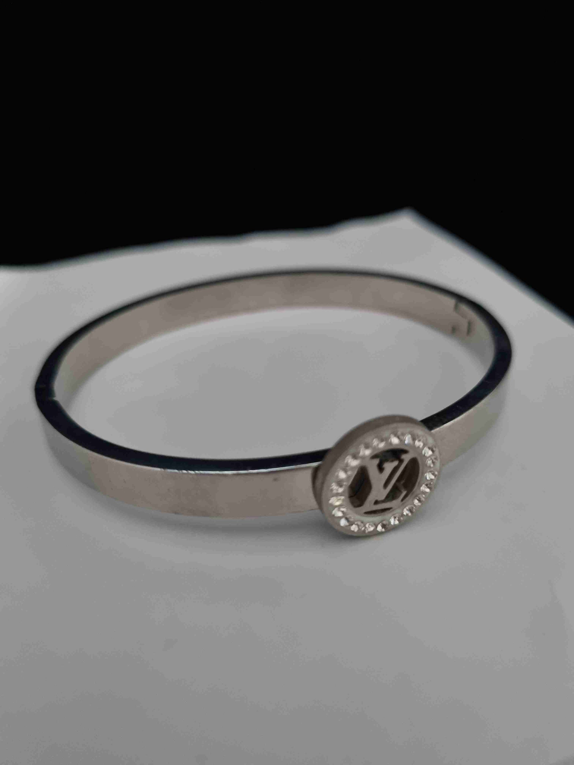 Elegant silver bracelet for women featuring a sleek and minimalist design.